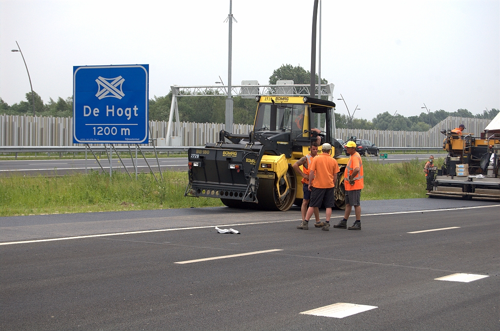 20100606-140614.bmp - Stroefheidszand instrooien...